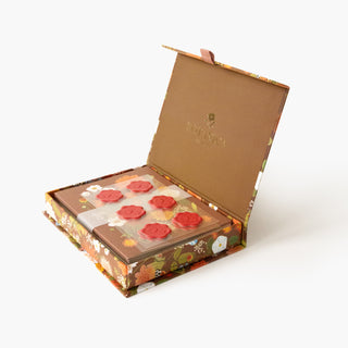 Russet Keepsake card box open to reveal a curated set of botanical greeting cards illustrated by Oana Befort.