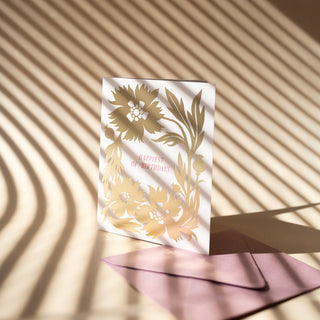 Detail of gold foil accents on Gold Poppies Birthday greeting card highlighting the premium foil stamping technique and elegant metallic finish that enhances the botanical poppy illustration