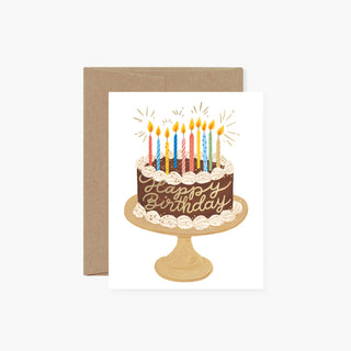 Chocolate Birthday Cake greeting card by Oana Befort for Botanica Paper Co. featuring hand-painted watercolor and gouache illustration of chocolate cake with gold foil accents on warm white matte cardstock, A2 size with blank interior