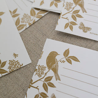 Close-up view of the Meadow Gift Labels, Pack Of 8 illustrated by Oana Befort for Botanica Paper Co.