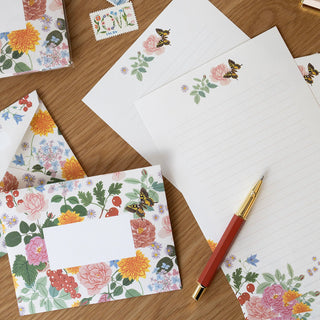 Reverie letter writing set from the gift bundle styled with a pen, by Oana Befort, Botanica Paper Co.