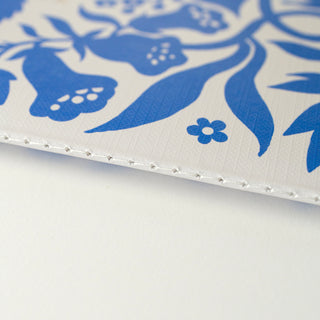 Close-up side view of the Blue Floral Undated Monthly Planner illustrated by Oana Befort for Botanica Paper Co.