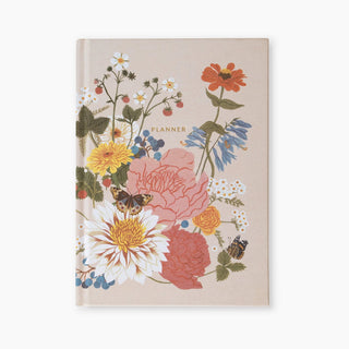 Garden Floral Linen-Bound undated planner illustrated by Oana Befort for Botanica Paper Co. featuring floral flowers on a linen cloth cover.