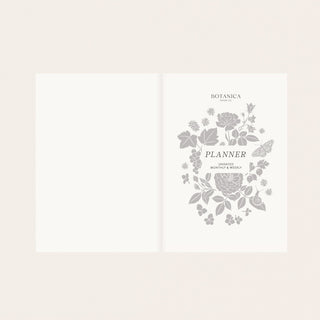 Reverie planner title page featuring elegant typography surrounded by delicate floral illustrations by Oana Befort for Botanica Paper Co., showcasing the sophisticated romantic aesthetic