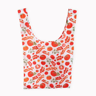 A reusable ripstop tote shopping bag with a white background and an all-over print of red tomatoes and green leaves, shown against a plain white background.