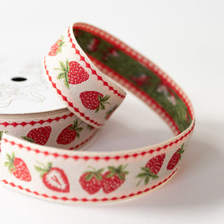 detail of embroidered strawberry ribbon