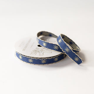 embroidered ribbon with soft gold stars and scalloped edge 