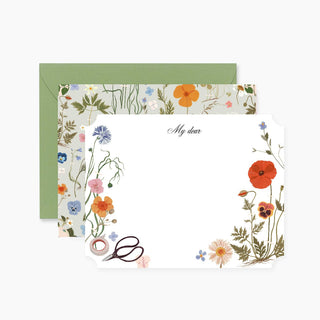 Set of four HERBARIUM notecards featuring vintage-style botanical illustrations inspired by pressed flower collections, designed by Oana Befort.