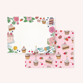 Notecard set with cakes and floral design on a white background