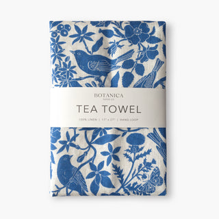 Songbirds 100% linen tea towel by Oana Befort featuring delicate blue botanical illustrations of perched songbirds among flowering branches on premium European linen, 17 x 27 inches
