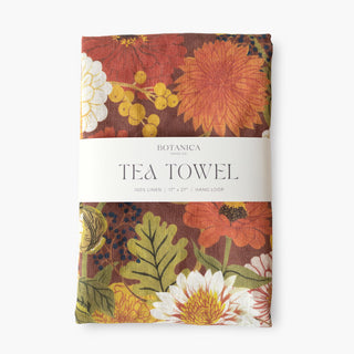 Fall 100% linen tea towel by Oana Befort featuring seasonal botanical illustrations of autumn leaves, berries, and harvest elements in warm earth tones on premium European linen, 17 x 27 inches
