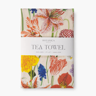 Spring 100% linen tea towel by Oana Befort featuring fresh botanical illustrations of blooming spring flowers, budding branches, and emerging foliage in soft pastel tones on premium European linen, 17 x 27 inches