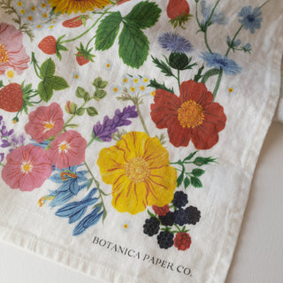 Detail of the SUMMER tea towel with cheerful botanical artwork, beautifully gift-ready and illustrated by Oana Befort.