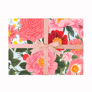floral gift wrap with pink ribbon
