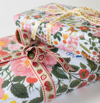 floral patterned gifts and decorative ribbons