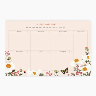 Poppy Field Weekly Overview Notepad featuring garden flowers on white backgorund. Illustrated art by Oana Befort for Botanica Paper Co.®