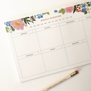 Closeup image of the Garden Weekly Overview Notepad on white background. Art by Oana Befort for Botanica Paper Co.